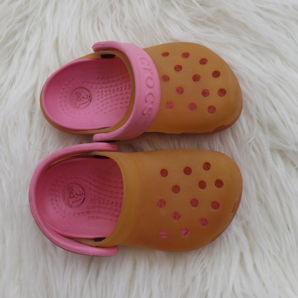 pink and yellow crocs